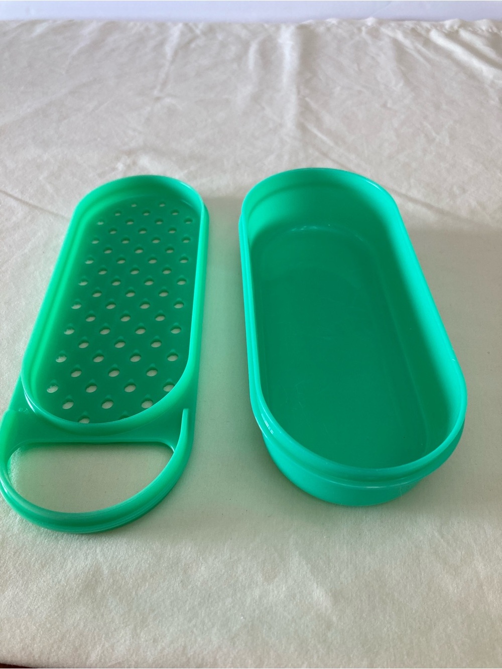 Tupperware mint green grater no lid.